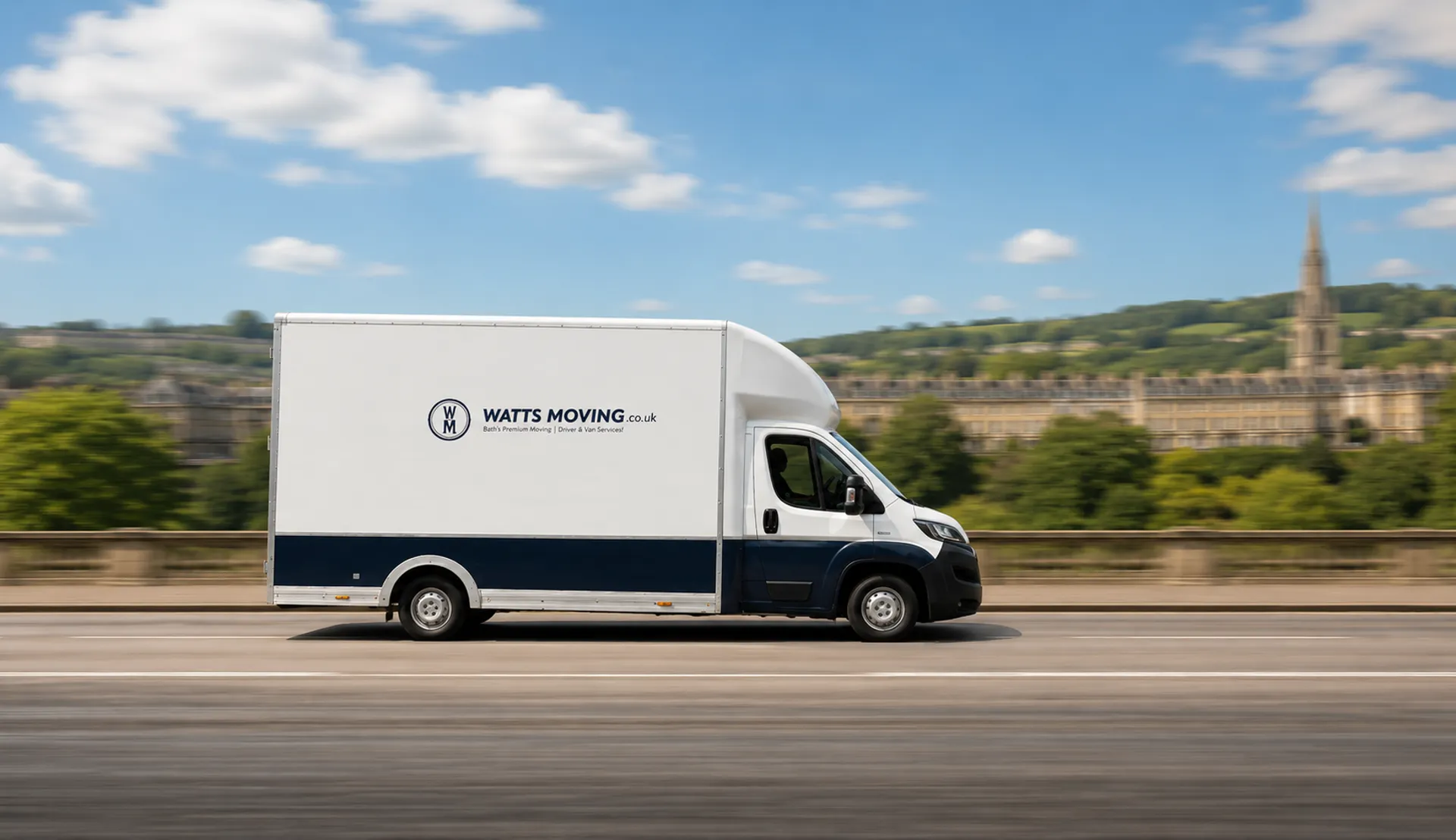 A Watts Moving removal van crossing a bridge over the river in Bath